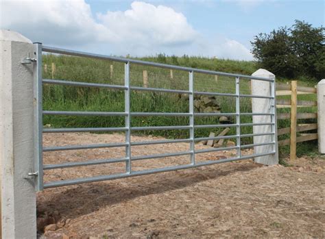 sheeted metal farm gates|12 foot metal field gates.